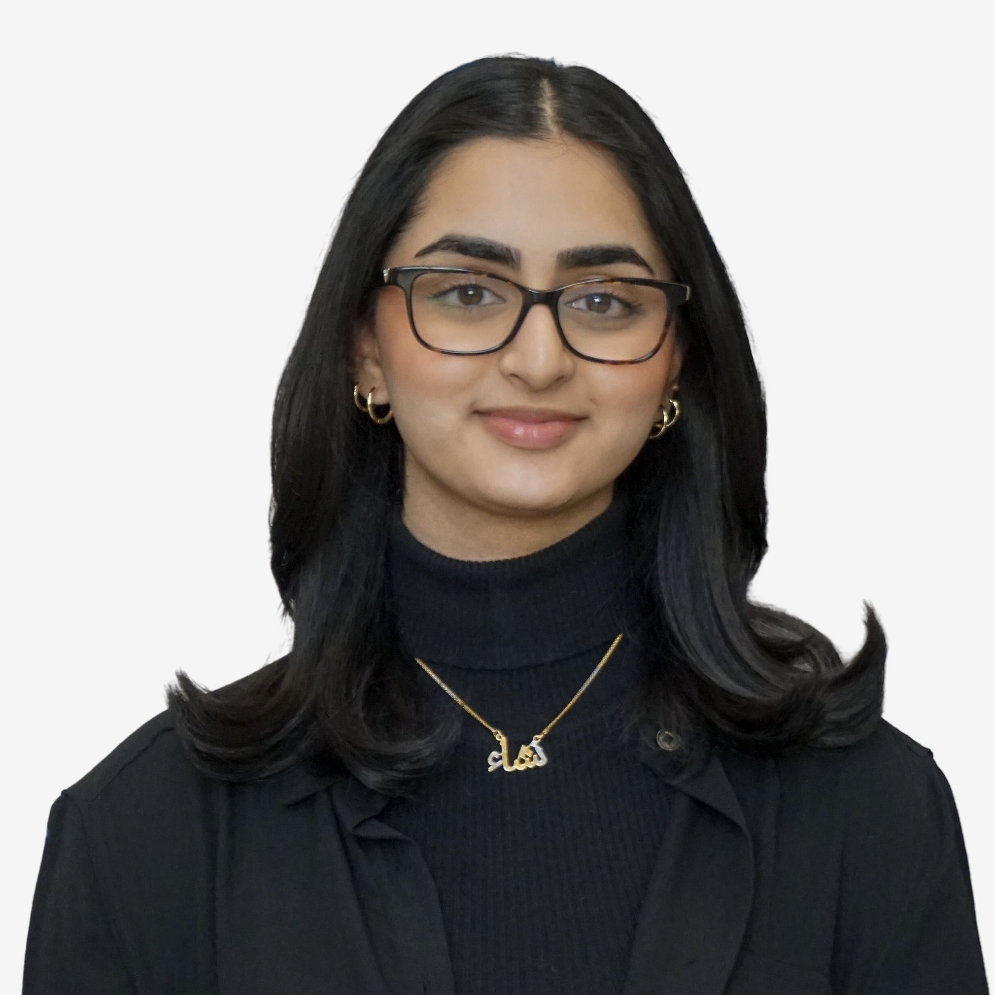Selfie of a female with fair skin, hazel eyes and straight black hair, wearing a white collared shirt with a necklace.